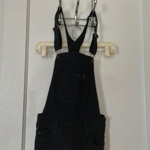 Celebrity Pink black jean overalls. Skinny leg size 27